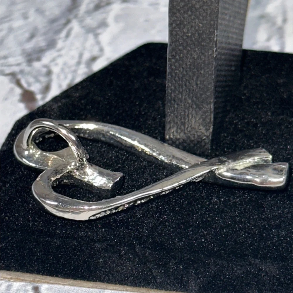 Elegant Silver Heart-Shaped Pendant CZ diamonds 2”